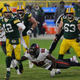 Aaron Rodgers has been second-guessed for not trying to run the ball in against Tampa Bay.